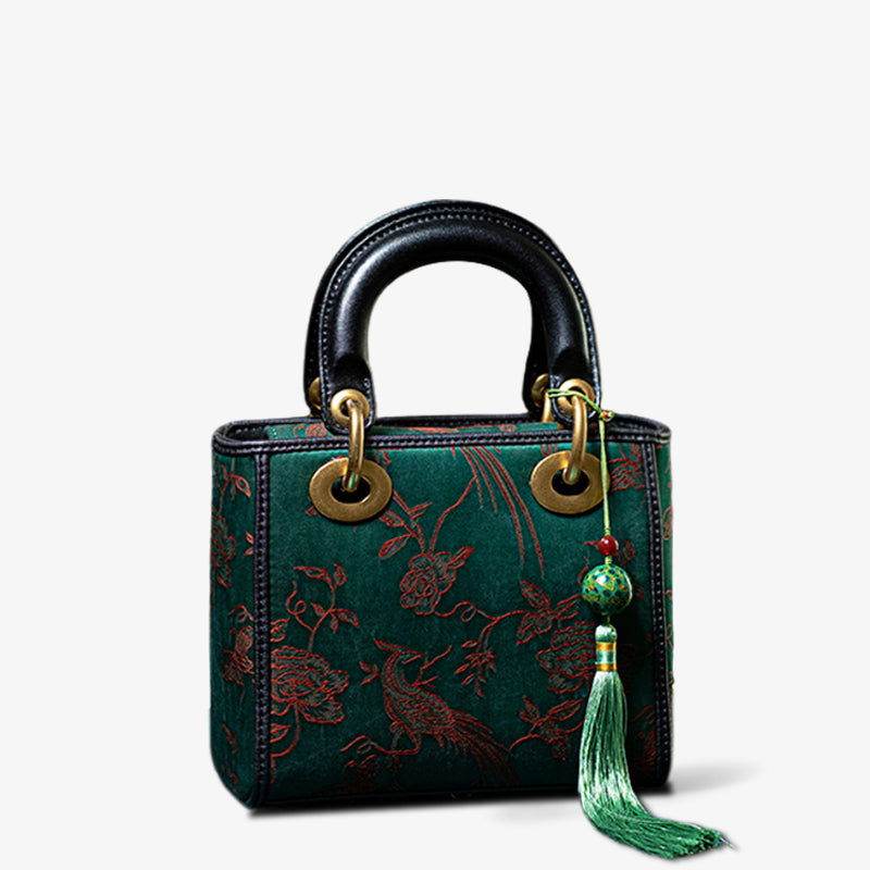 Embroidered green silk handbag